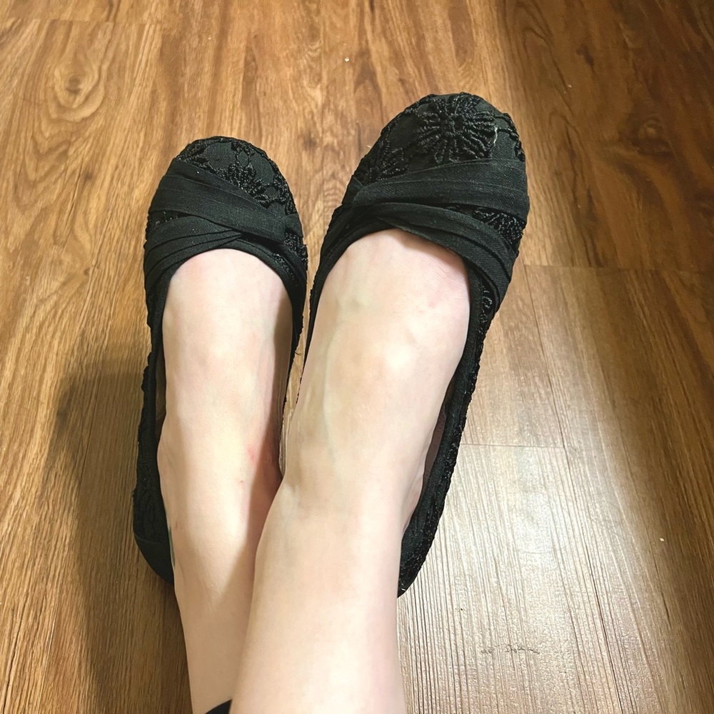 Well worn women’s flats